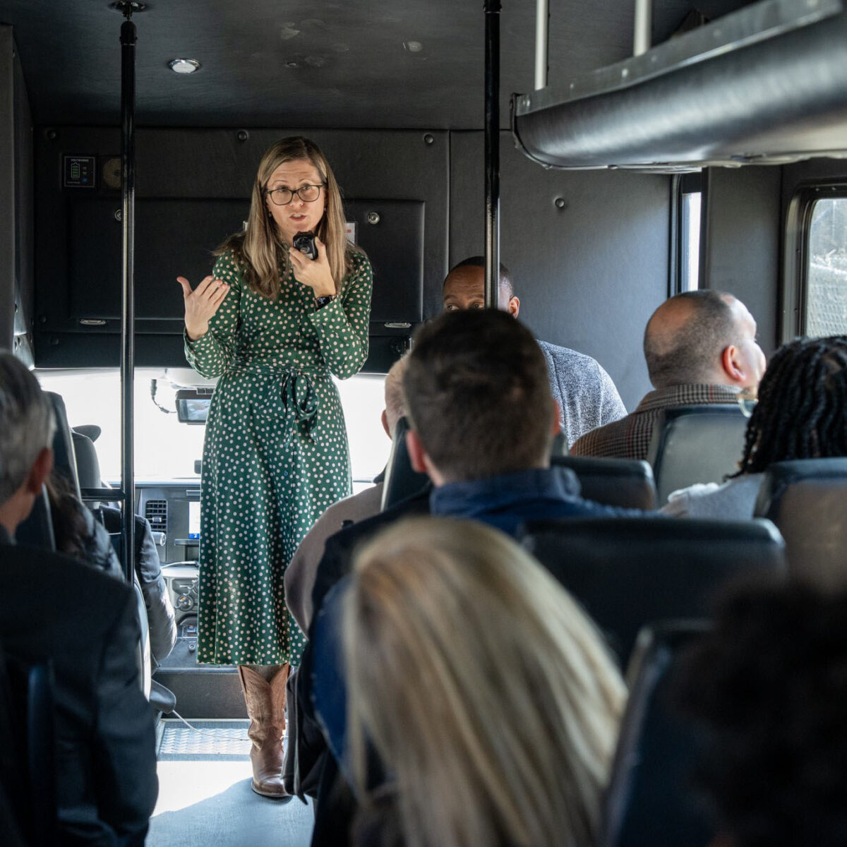 Housing learning exchange group on a bus tour of Atlanta