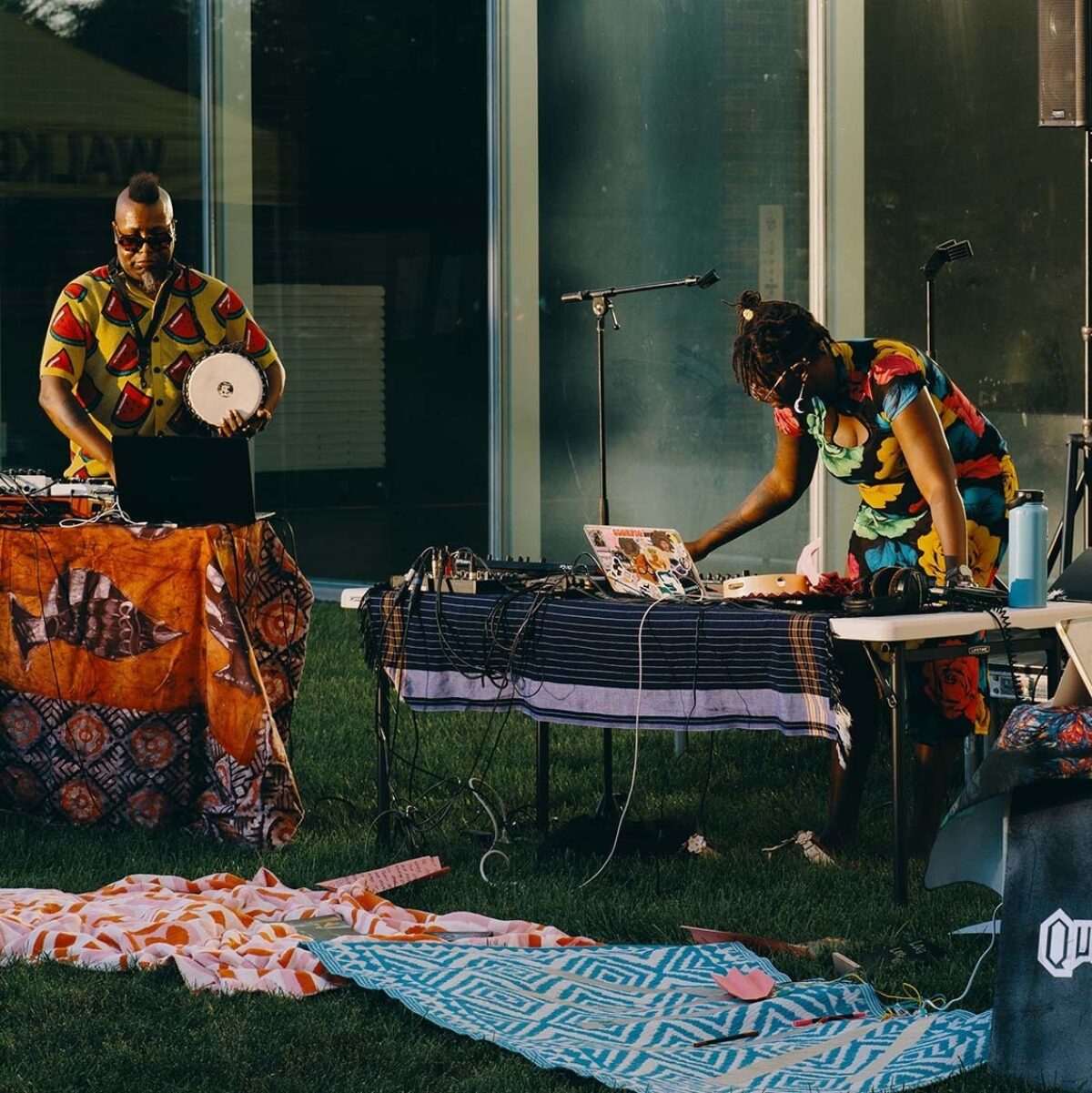 Performers playing instruments and mixing sounds