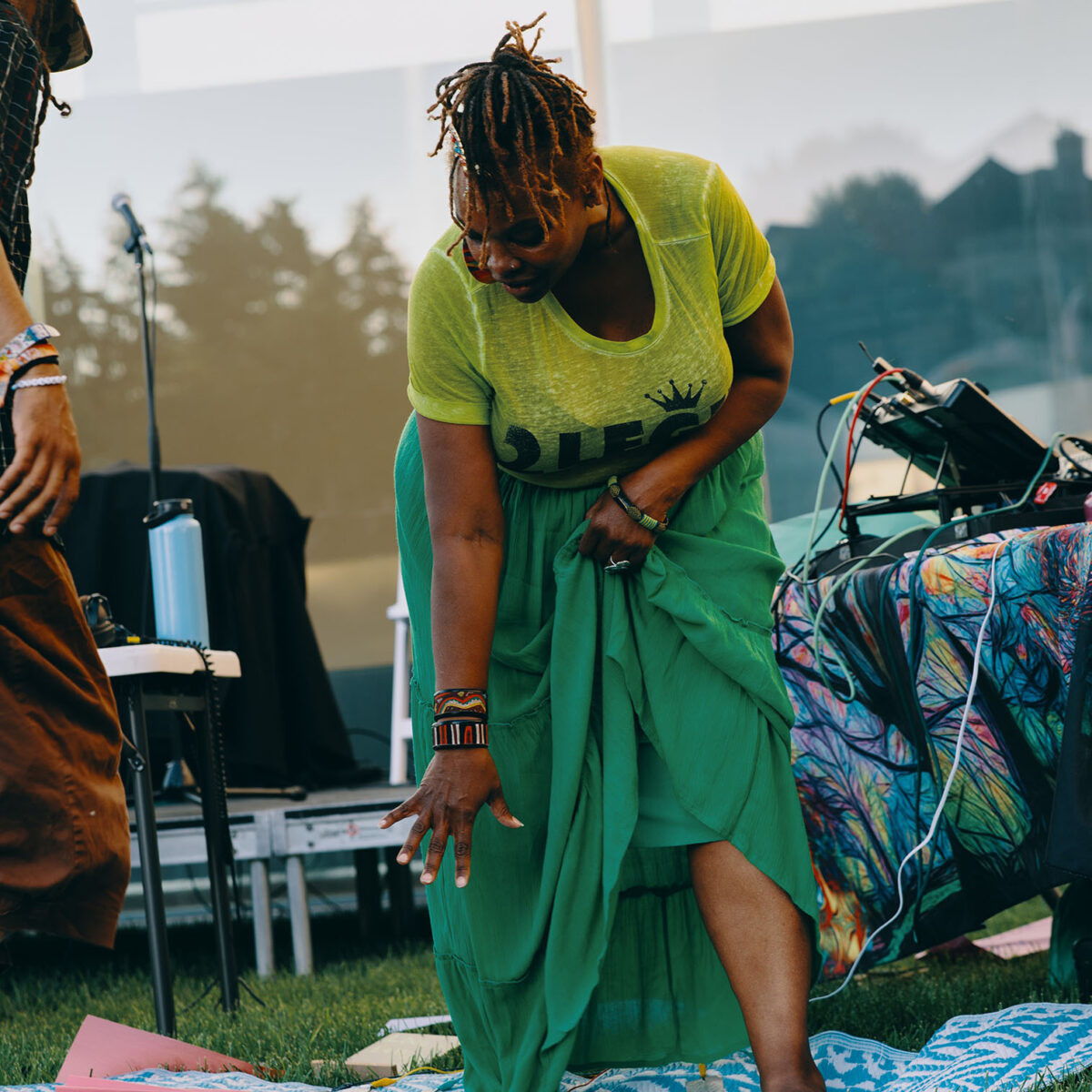 Queen Drea dancing at an outdoor performancer