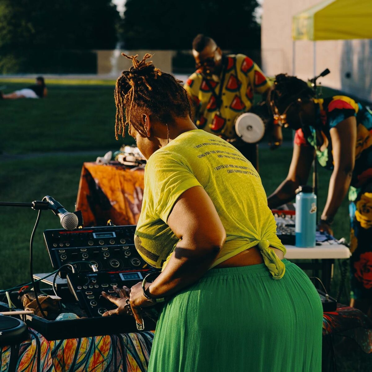 Queen Drea performing and mixing sounds live