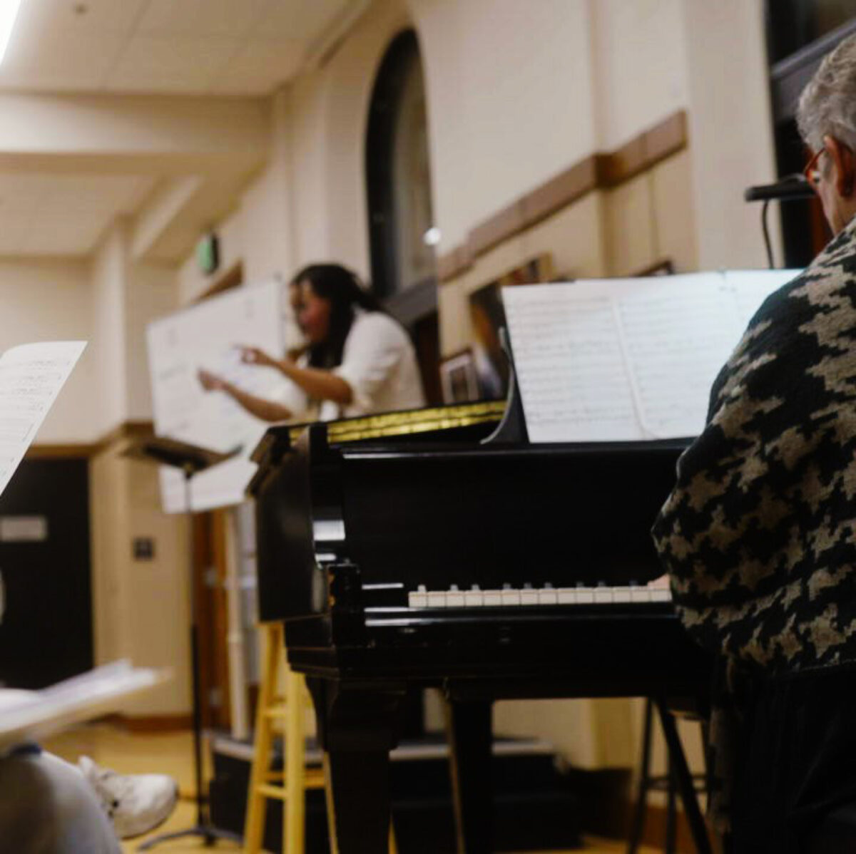 Waigwa conducting with the accompanist in the foreground