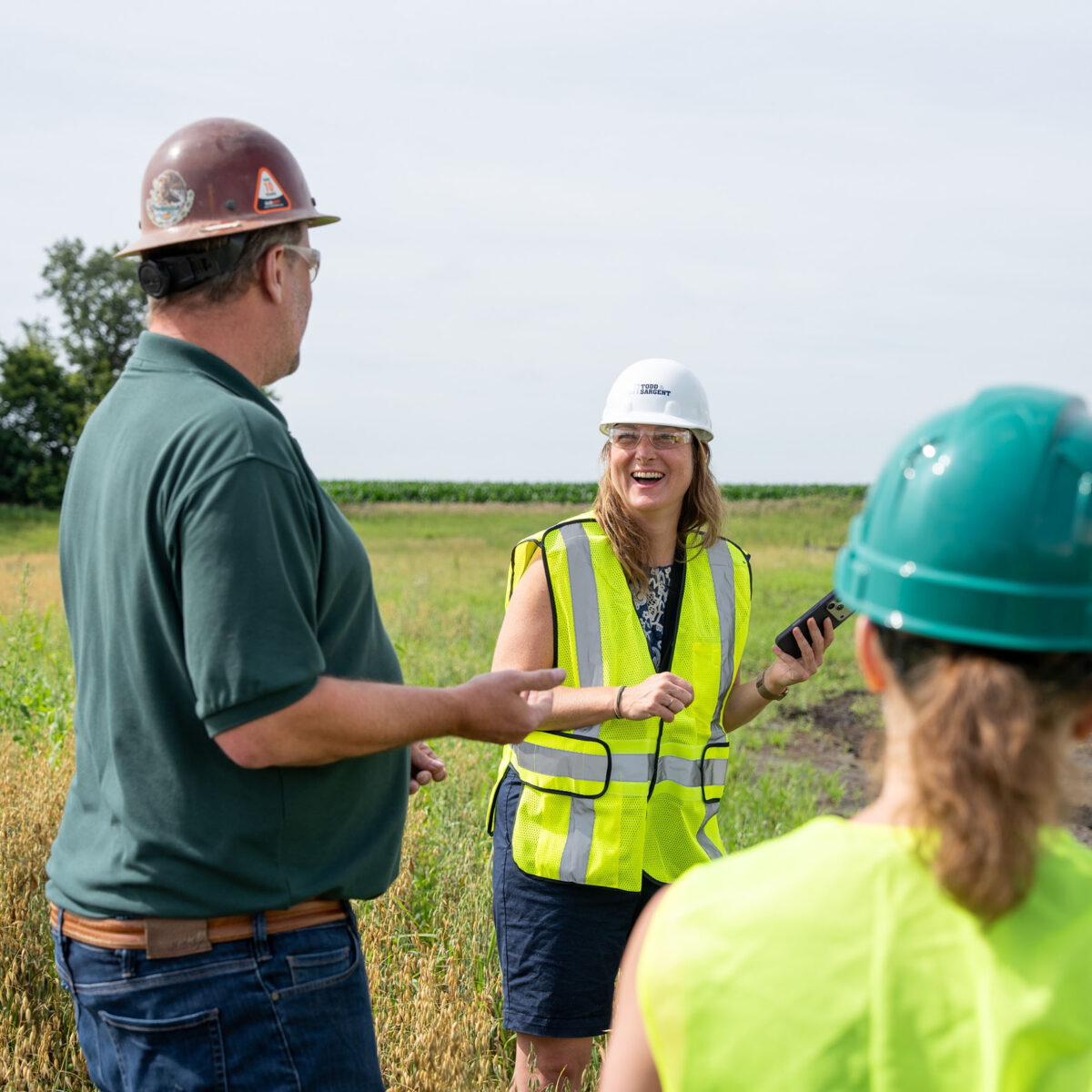 Foundation staff touring the grounds at Green Acres Milling