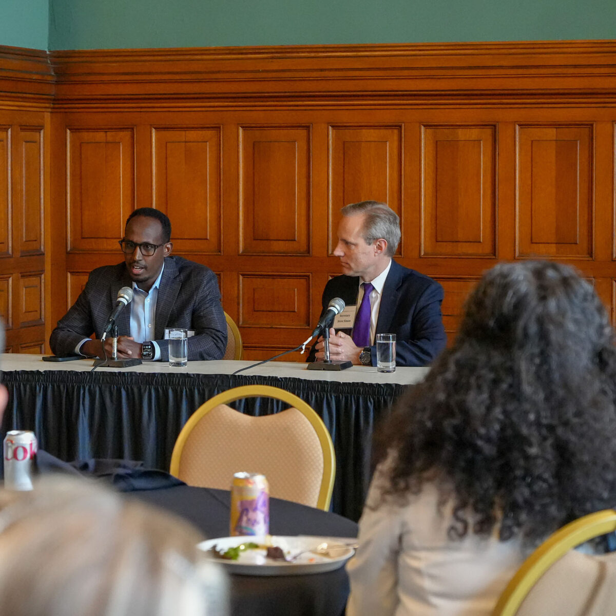 Mukhtar Ibrahim and Steve Simon speaking on a panel