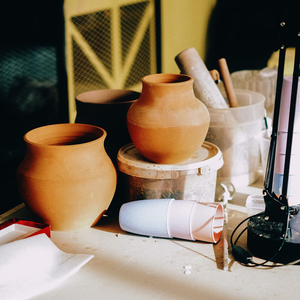 Pottery sitting on a work table