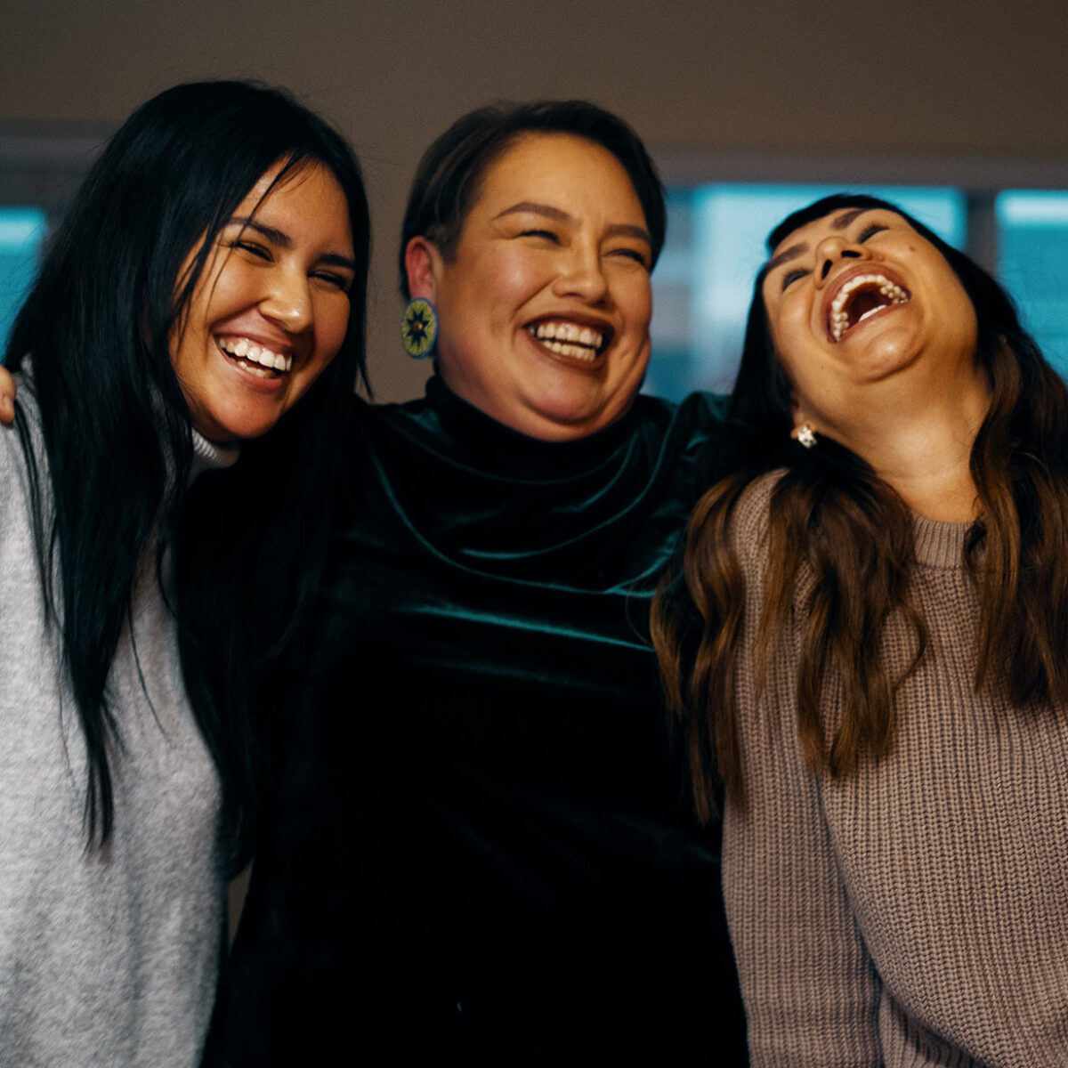 Raine sharing a laugh with others