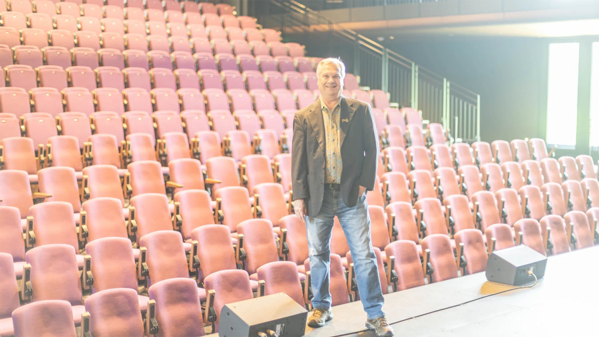 John Davis standing in the Warroad River Place theatre space 2