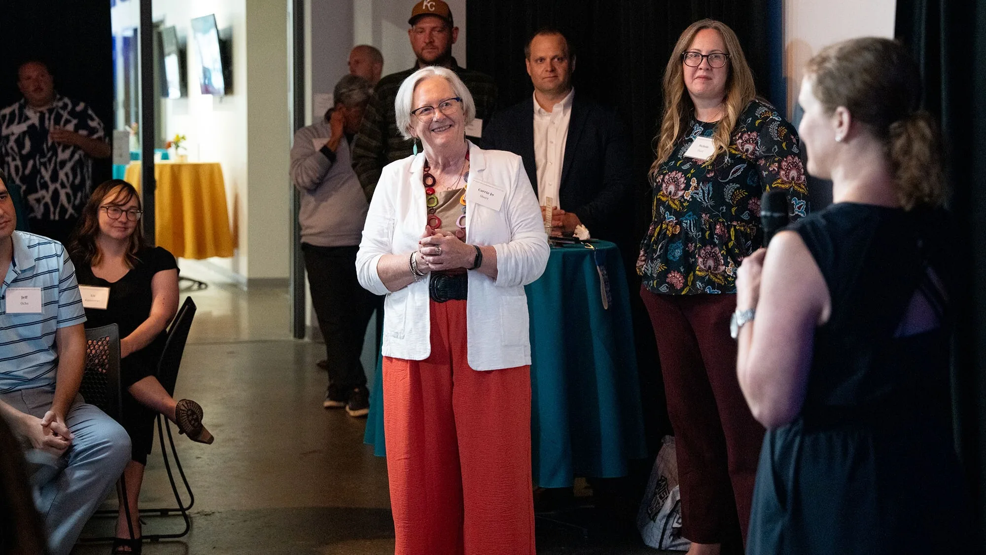 Carrie Jo being celebrated at the investments launch event