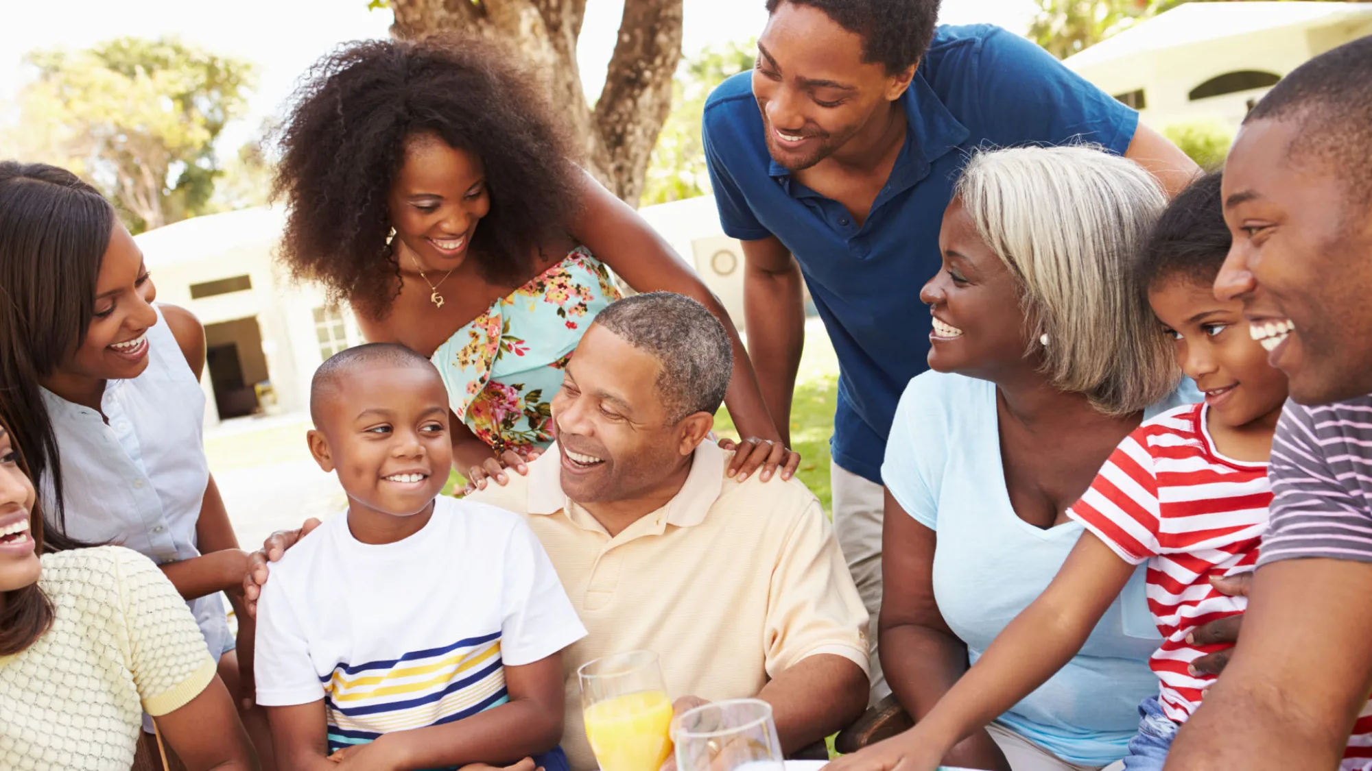 Multi generational family enjoying a picnic together