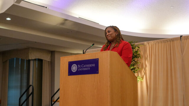 Chanda Smith Baker speaking at an event 16x9
