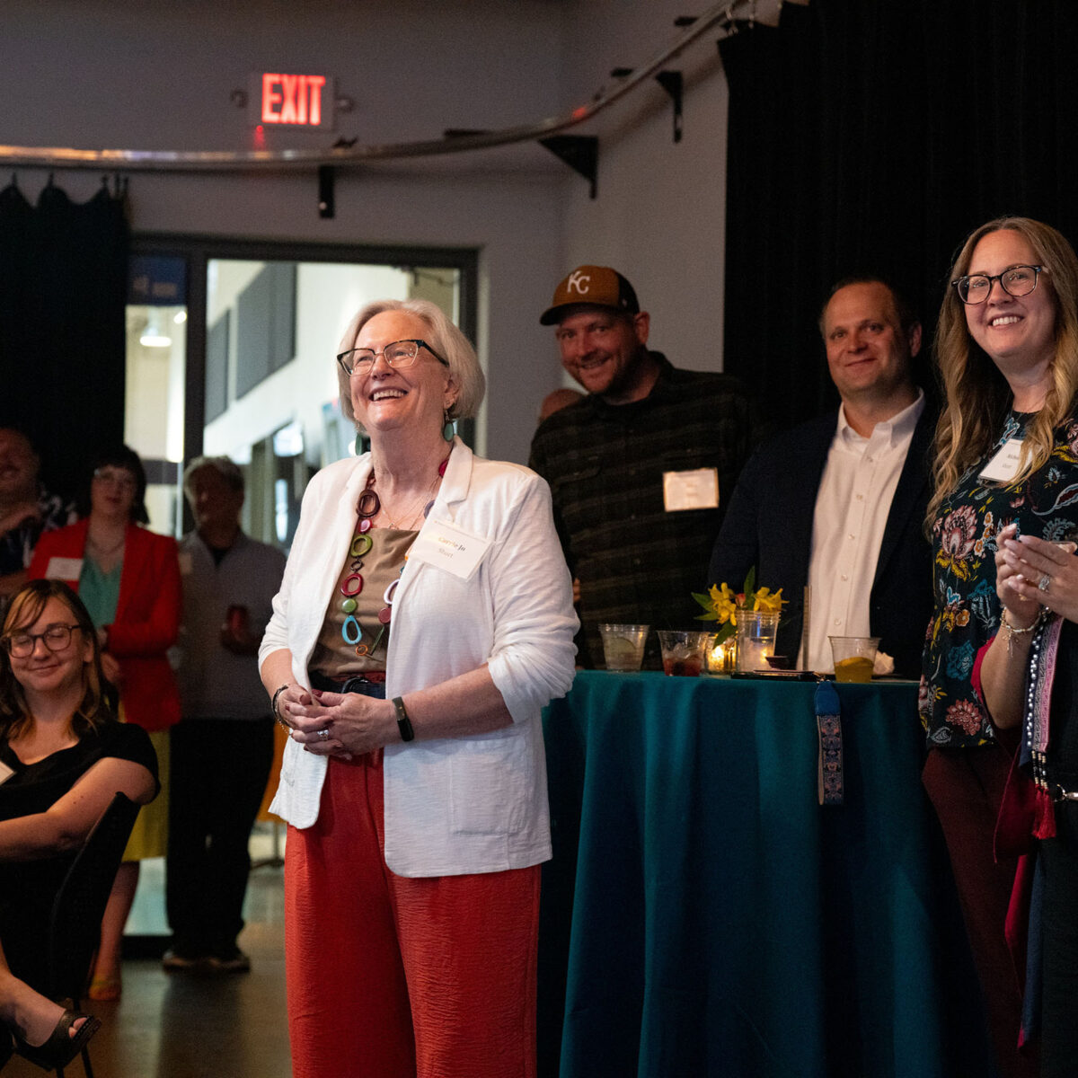 Carrie Jo being celebrated at investment portfolio launch event