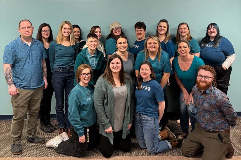 Program for Aid to Victims of Sexual Assault staff wearing teal
