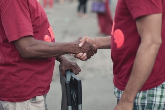AEDA two people shaking hands hero